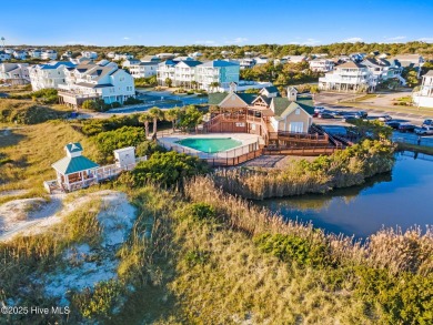 Build your dream home on this beautiful .61-acre wooded lot in on Members Club At St. James Plantation in North Carolina - for sale on GolfHomes.com, golf home, golf lot