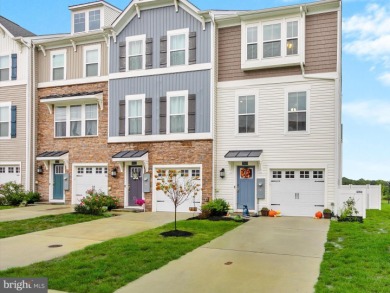 Welcome to 35413 Wright Way, a beautiful three-story end-unit on Plantation Lakes Golf and Country Club in Delaware - for sale on GolfHomes.com, golf home, golf lot