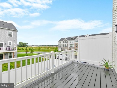 Welcome to 35413 Wright Way, a beautiful three-story end-unit on Plantation Lakes Golf and Country Club in Delaware - for sale on GolfHomes.com, golf home, golf lot