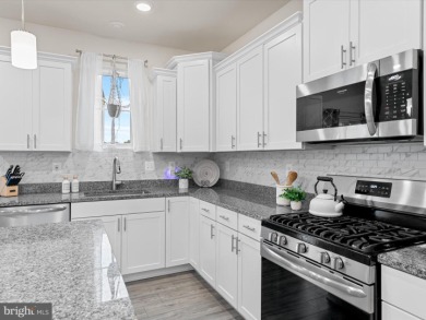 Welcome to 35413 Wright Way, a beautiful three-story end-unit on Plantation Lakes Golf and Country Club in Delaware - for sale on GolfHomes.com, golf home, golf lot