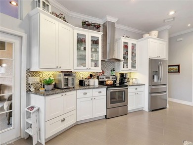 Welcome to this beautifully maintained residence located on a on Imperial Golf Club in Florida - for sale on GolfHomes.com, golf home, golf lot