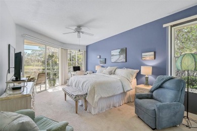 Indulge in unparalleled views of the tranquil lake and verdant on Calusa Lakes Golf Club in Florida - for sale on GolfHomes.com, golf home, golf lot