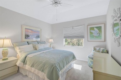 Indulge in unparalleled views of the tranquil lake and verdant on Calusa Lakes Golf Club in Florida - for sale on GolfHomes.com, golf home, golf lot