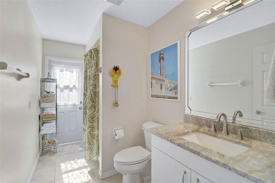 Indulge in unparalleled views of the tranquil lake and verdant on Calusa Lakes Golf Club in Florida - for sale on GolfHomes.com, golf home, golf lot