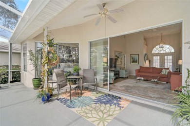Indulge in unparalleled views of the tranquil lake and verdant on Calusa Lakes Golf Club in Florida - for sale on GolfHomes.com, golf home, golf lot