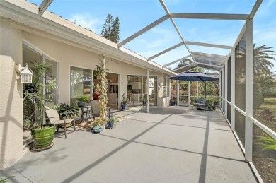 Indulge in unparalleled views of the tranquil lake and verdant on Calusa Lakes Golf Club in Florida - for sale on GolfHomes.com, golf home, golf lot