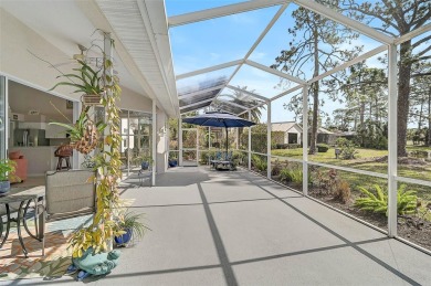 Indulge in unparalleled views of the tranquil lake and verdant on Calusa Lakes Golf Club in Florida - for sale on GolfHomes.com, golf home, golf lot