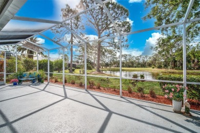 Indulge in unparalleled views of the tranquil lake and verdant on Calusa Lakes Golf Club in Florida - for sale on GolfHomes.com, golf home, golf lot