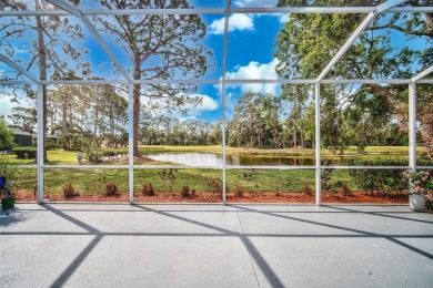 Indulge in unparalleled views of the tranquil lake and verdant on Calusa Lakes Golf Club in Florida - for sale on GolfHomes.com, golf home, golf lot