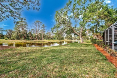 Indulge in unparalleled views of the tranquil lake and verdant on Calusa Lakes Golf Club in Florida - for sale on GolfHomes.com, golf home, golf lot