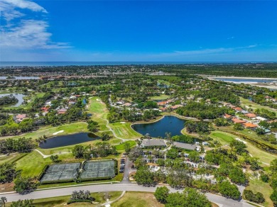 Indulge in unparalleled views of the tranquil lake and verdant on Calusa Lakes Golf Club in Florida - for sale on GolfHomes.com, golf home, golf lot
