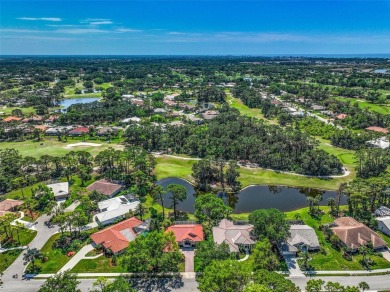Indulge in unparalleled views of the tranquil lake and verdant on Calusa Lakes Golf Club in Florida - for sale on GolfHomes.com, golf home, golf lot