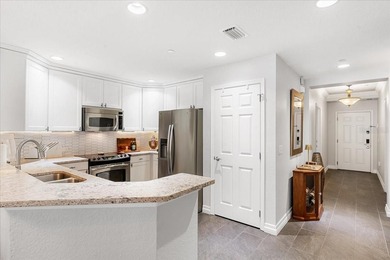 Experience elevated resort living in this fully renovated on Reunion Resort Golf Course in Florida - for sale on GolfHomes.com, golf home, golf lot