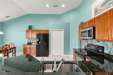 Your Sunny South Naples oasis awaits in this Large Pool Home! on Eagle Lakes Golf Club in Florida - for sale on GolfHomes.com, golf home, golf lot