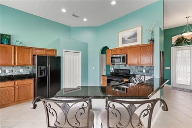 Your Sunny South Naples oasis awaits in this Large Pool Home! on Eagle Lakes Golf Club in Florida - for sale on GolfHomes.com, golf home, golf lot