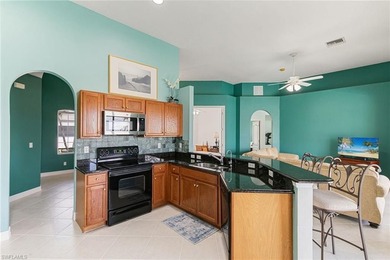 Your Sunny South Naples oasis awaits in this Large Pool Home! on Eagle Lakes Golf Club in Florida - for sale on GolfHomes.com, golf home, golf lot