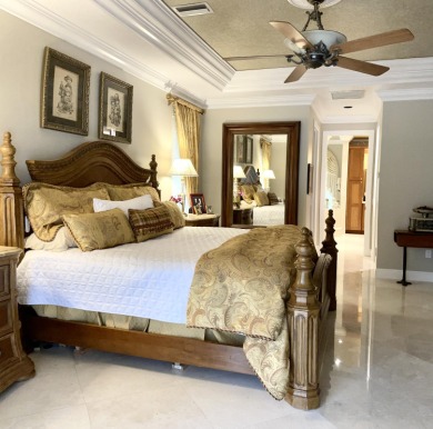 Casual elegance at its finest.  Located in the prestigious PGA on The Legacy Golf and Tennis Club in Florida - for sale on GolfHomes.com, golf home, golf lot
