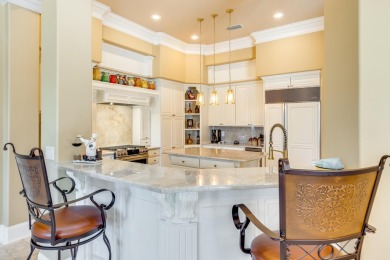 Boasting $150,000 in upgrades is straight out of Tuscany on Regatta Bay Golf and Country Club in Florida - for sale on GolfHomes.com, golf home, golf lot