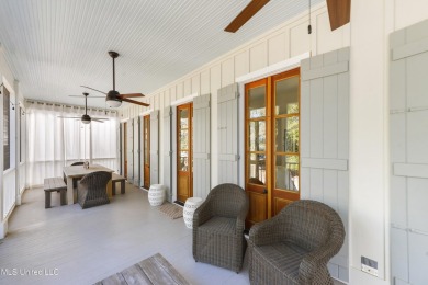 Welcome to this stunning 4-bedroom waterfront retreat, nestled on Diamondhead Country Club in Mississippi - for sale on GolfHomes.com, golf home, golf lot