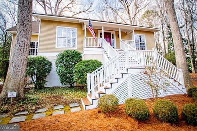 Welcome to classic Southern charm in highly sought-after Sunset on Sunset Hills Country Club in Georgia - for sale on GolfHomes.com, golf home, golf lot