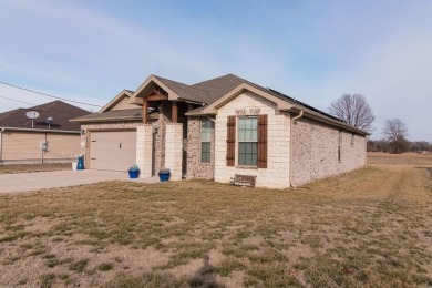 You must see this stunning one level brick/stone, 3bed/2bath on Neosho Municipal Golf Course in Missouri - for sale on GolfHomes.com, golf home, golf lot