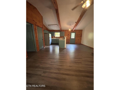 Discover your perfect escape in the heart of Townsend, Tennessee on Laurel Valley Golf Course in Tennessee - for sale on GolfHomes.com, golf home, golf lot