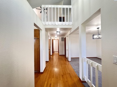 Keep an eye on all the golfing action right from your living on Meadow Springs Country Club in Washington - for sale on GolfHomes.com, golf home, golf lot