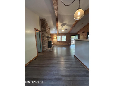 Discover your perfect escape in the heart of Townsend, Tennessee on Laurel Valley Golf Course in Tennessee - for sale on GolfHomes.com, golf home, golf lot