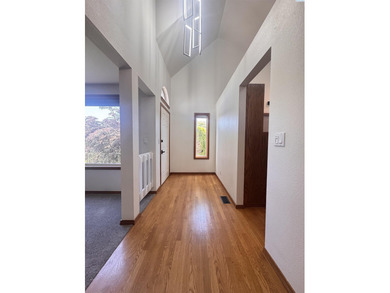 Keep an eye on all the golfing action right from your living on Meadow Springs Country Club in Washington - for sale on GolfHomes.com, golf home, golf lot