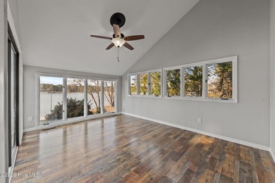 Welcome home to this beautiful lakefront property in Seven Lakes on Seven Lakes Country Club in North Carolina - for sale on GolfHomes.com, golf home, golf lot