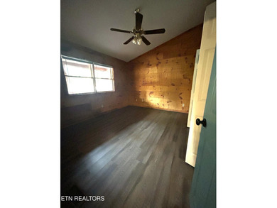 Discover your perfect escape in the heart of Townsend, Tennessee on Laurel Valley Golf Course in Tennessee - for sale on GolfHomes.com, golf home, golf lot