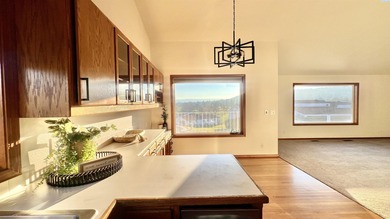 Keep an eye on all the golfing action right from your living on Meadow Springs Country Club in Washington - for sale on GolfHomes.com, golf home, golf lot