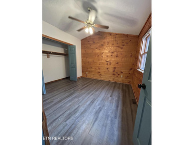 Discover your perfect escape in the heart of Townsend, Tennessee on Laurel Valley Golf Course in Tennessee - for sale on GolfHomes.com, golf home, golf lot