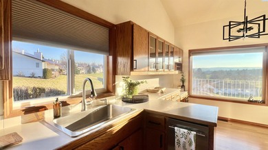 Keep an eye on all the golfing action right from your living on Meadow Springs Country Club in Washington - for sale on GolfHomes.com, golf home, golf lot