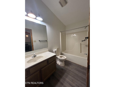 Discover your perfect escape in the heart of Townsend, Tennessee on Laurel Valley Golf Course in Tennessee - for sale on GolfHomes.com, golf home, golf lot