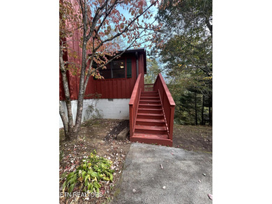 Discover your perfect escape in the heart of Townsend, Tennessee on Laurel Valley Golf Course in Tennessee - for sale on GolfHomes.com, golf home, golf lot