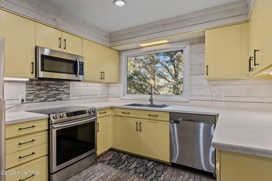 Welcome home to this beautiful lakefront property in Seven Lakes on Seven Lakes Country Club in North Carolina - for sale on GolfHomes.com, golf home, golf lot