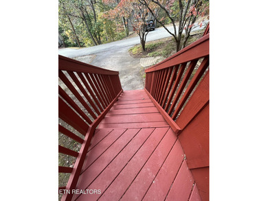 Discover your perfect escape in the heart of Townsend, Tennessee on Laurel Valley Golf Course in Tennessee - for sale on GolfHomes.com, golf home, golf lot