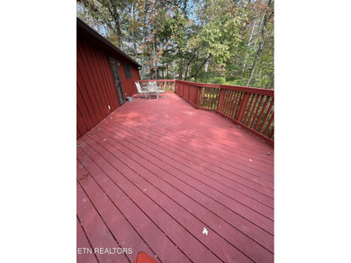 Discover your perfect escape in the heart of Townsend, Tennessee on Laurel Valley Golf Course in Tennessee - for sale on GolfHomes.com, golf home, golf lot