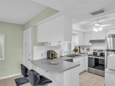 Rarely Available Ground-Floor Condo in Vibrant 55+ Green Dolphin on Tarpon Springs Golf Course in Florida - for sale on GolfHomes.com, golf home, golf lot
