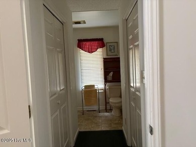 This two-bedroom townhome is located on the 12th hole of on Pinehurst  No. 6 Golf Course in North Carolina - for sale on GolfHomes.com, golf home, golf lot