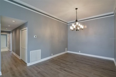 Welcome to your dream villa in the beautiful gated community of on Harbor Hills Country Club in Florida - for sale on GolfHomes.com, golf home, golf lot