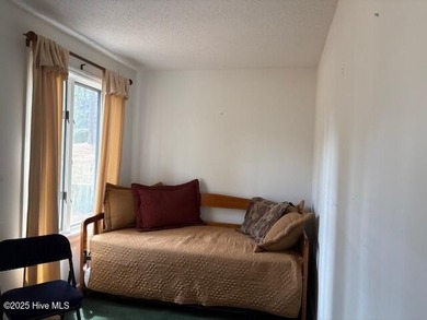 This two-bedroom townhome is located on the 12th hole of on Pinehurst  No. 6 Golf Course in North Carolina - for sale on GolfHomes.com, golf home, golf lot