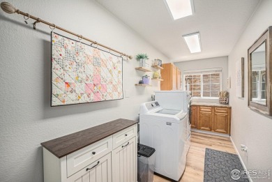 Welcome to this beautifully upgraded home nestled in the on The Broadlands Golf Course in Colorado - for sale on GolfHomes.com, golf home, golf lot