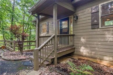 Discover mountain living at its finest in this beautiful on Big Canoe Golf Club - Cherokee in Georgia - for sale on GolfHomes.com, golf home, golf lot