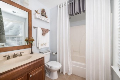 Welcome to 120 Fresh Meadow Lane - an elegant and spacious 2,798 on Dunes West Golf Club in South Carolina - for sale on GolfHomes.com, golf home, golf lot
