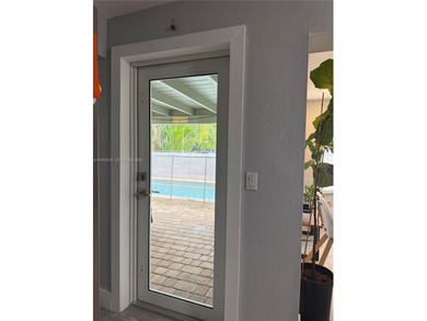 3/2 waterfront pool home in desirable Cooper City. Open-concept on Cooper Colony Country Club in Florida - for sale on GolfHomes.com, golf home, golf lot