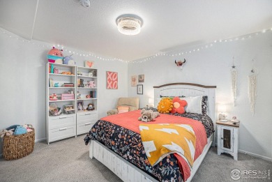 Welcome to this beautifully upgraded home nestled in the on The Broadlands Golf Course in Colorado - for sale on GolfHomes.com, golf home, golf lot