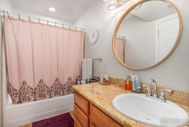 Welcome to this beautifully upgraded home nestled in the on The Broadlands Golf Course in Colorado - for sale on GolfHomes.com, golf home, golf lot