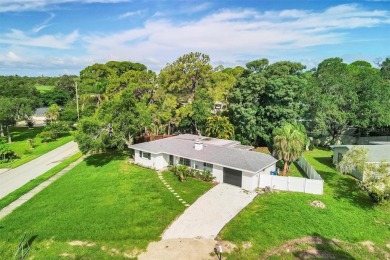 3 BED / 2 BATH / 1 CAR GARAGE HOME ON A LARGE .29 ACRE CORNER on Sara Bay Country Club in Florida - for sale on GolfHomes.com, golf home, golf lot